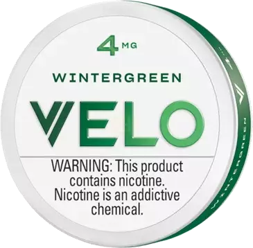 VELO wintergreen nicotine pouch with warning label on a white background