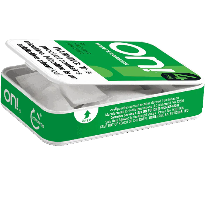 on! Wintergreen 4MG - Nicotine Pouches open can showing pouches